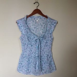 LOFT sleeveless blouse with elastic waistband.